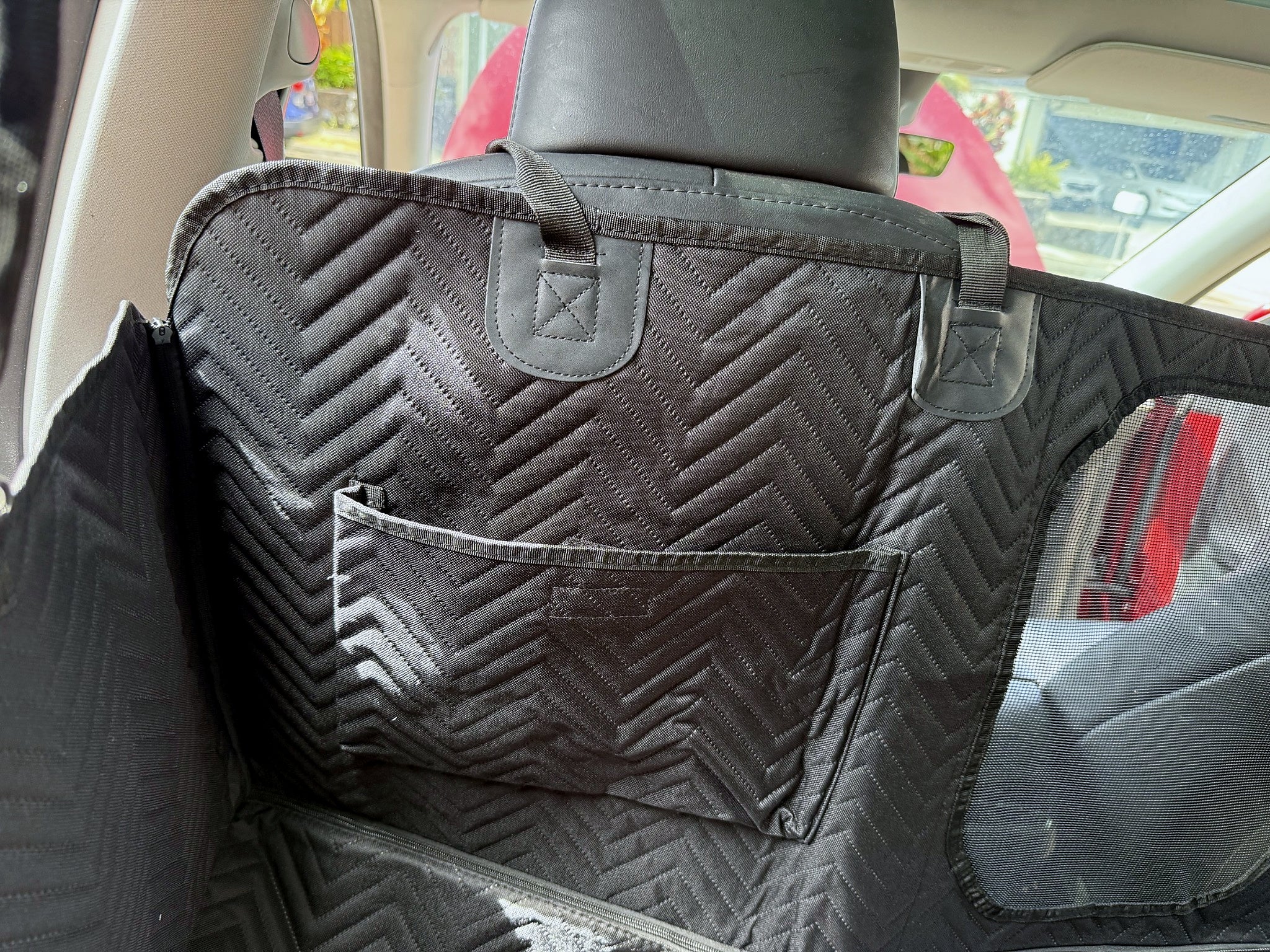 Storage pocket on the quilted dog car seat cover